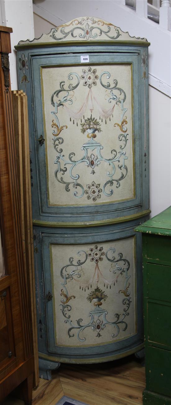 An Italian 18th century design painted bowfronted standing corner cupboard